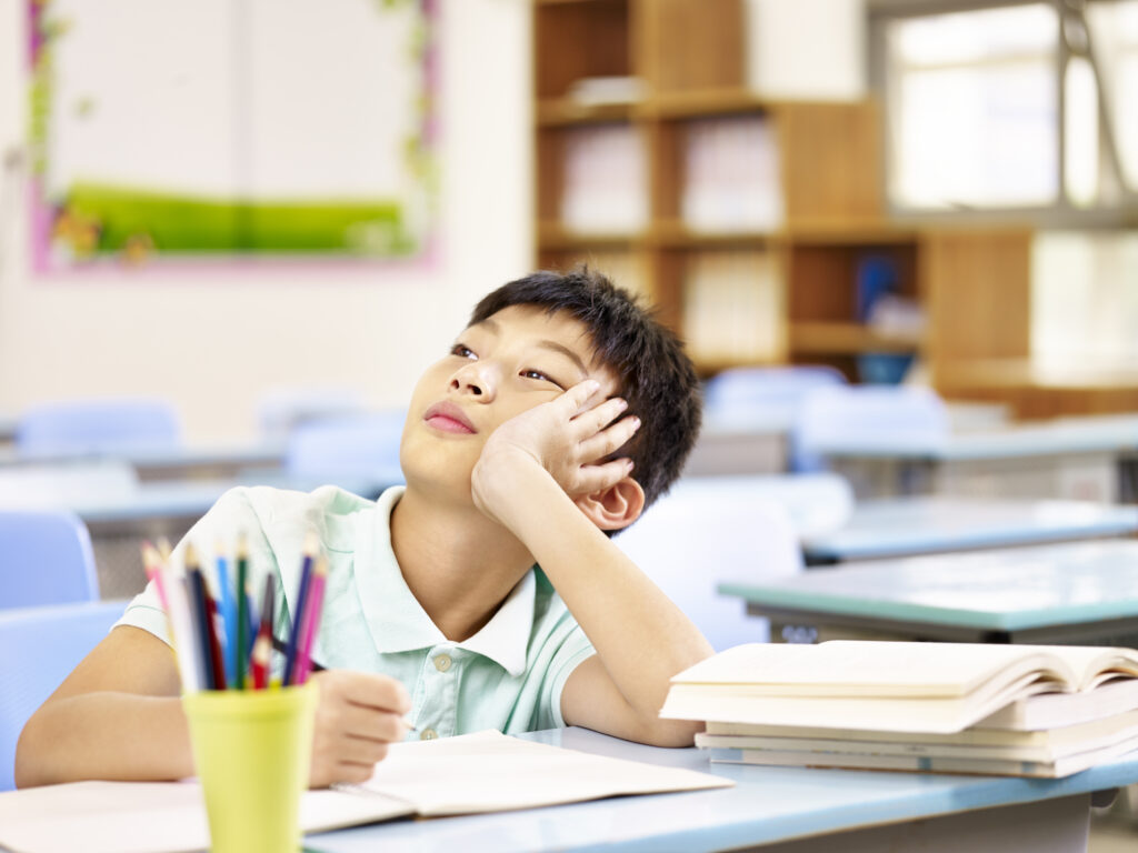 USP: Teen & Child ADHD - A child in class not paying attention