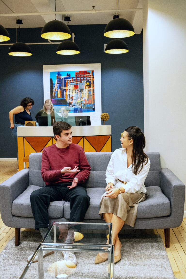 USP: Young people in Union Square Practice office chatting with each other